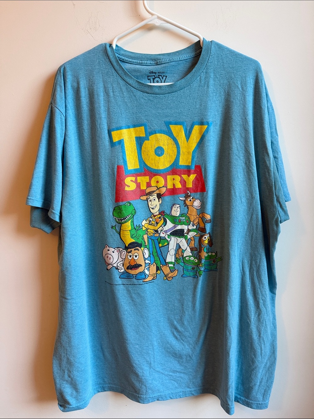 Disney Toy Story Light Blue Graphic Tee with Colorful Character Print